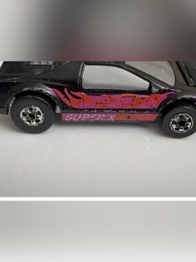 Mattel Black Toy Car with Pink and Orange Flame Decals